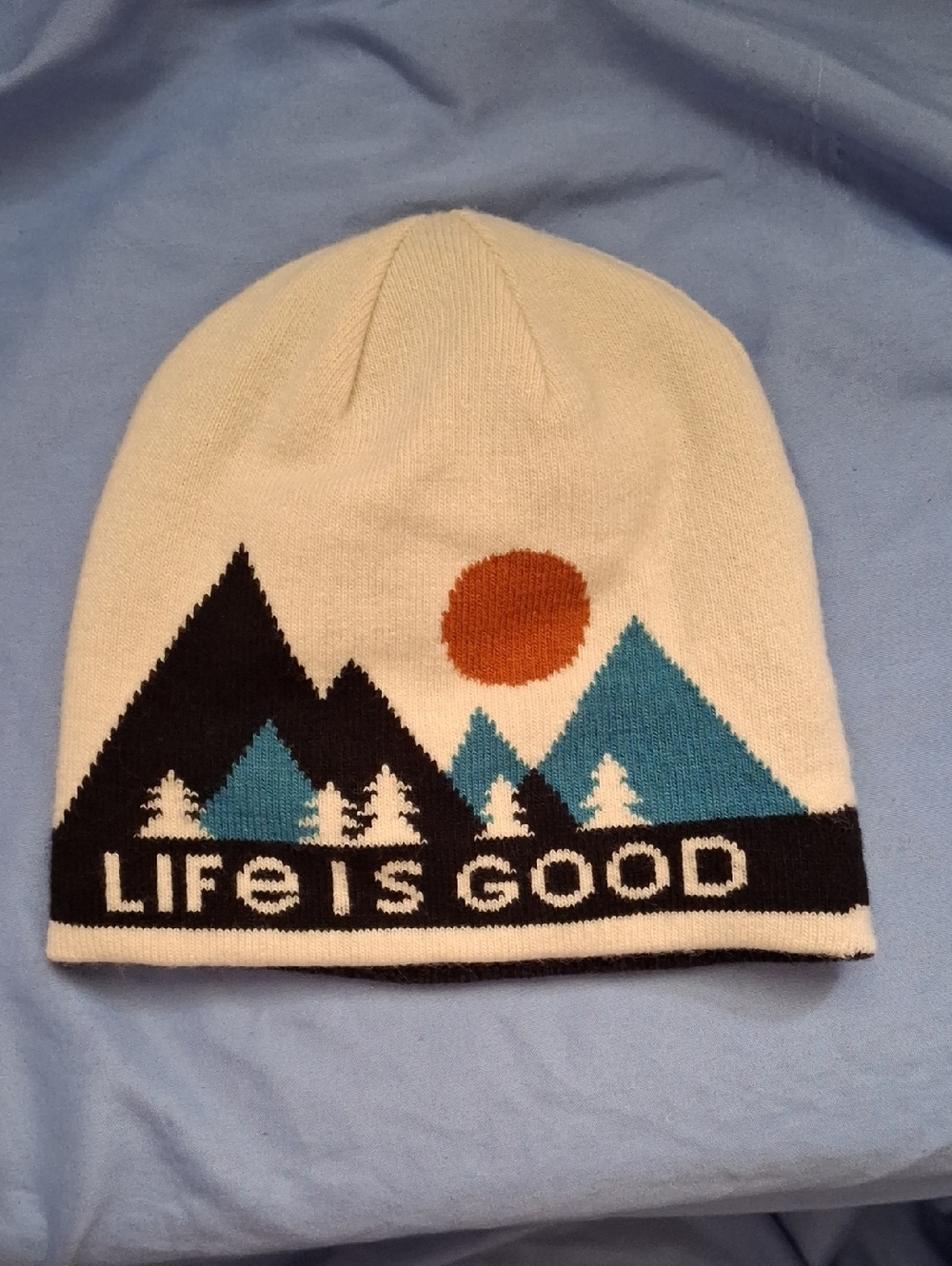 Life Is Good Cream Beanie with Black, Teal & Orange Mountain Graphic